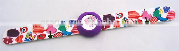 Coloured drawing on strap for silicone slap watches
