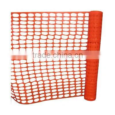 orange plastic safety barrier fence