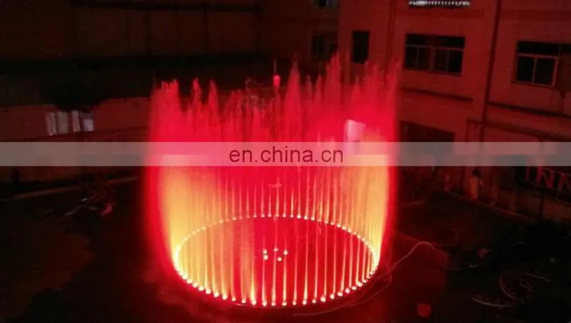 Outdoor kid playing colorful music dancing floor fountain