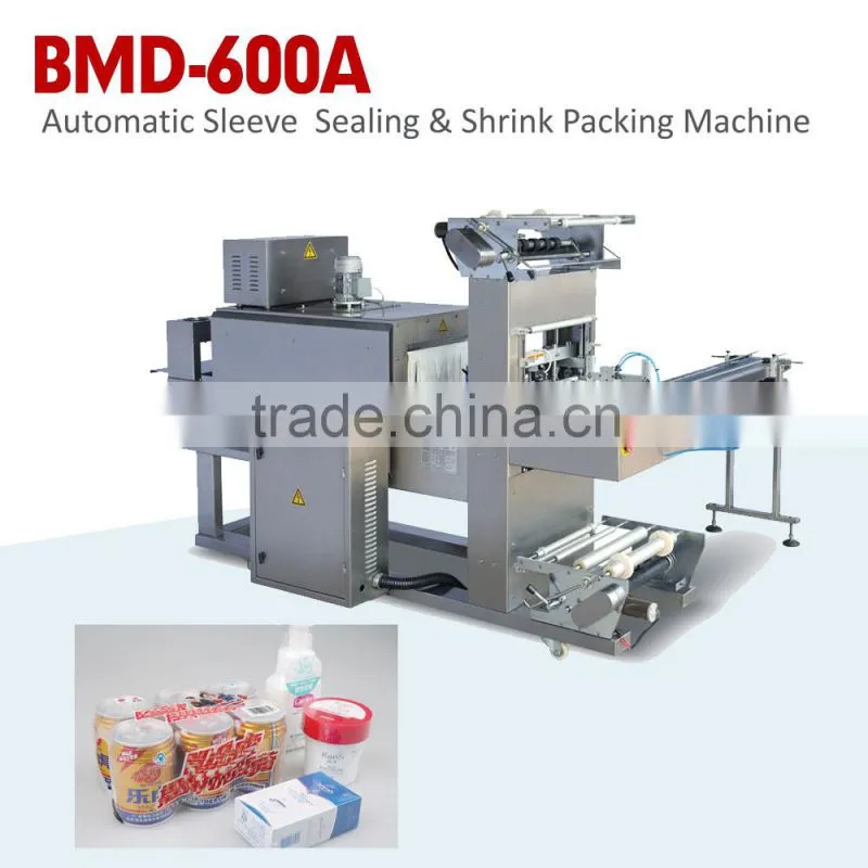 AUTOMATIC SLEEVE SEALING AND SHRINK PACKING MACHINE