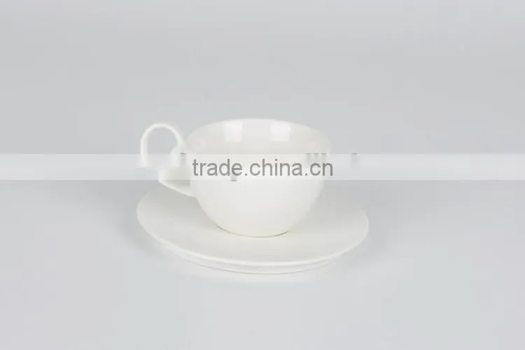 delicate fine porcelain coffee cup with saucer