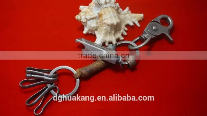 Antique silver alloy keychain with coiled real leather cord and beer bottle opener