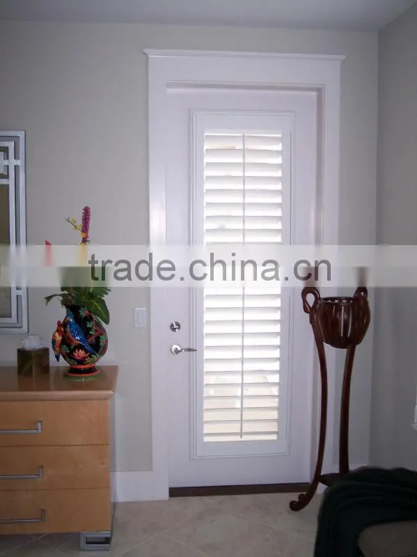 wooden unfinished louvered door