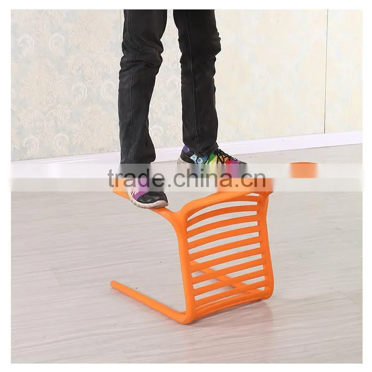 Simple stackable red plastic chair