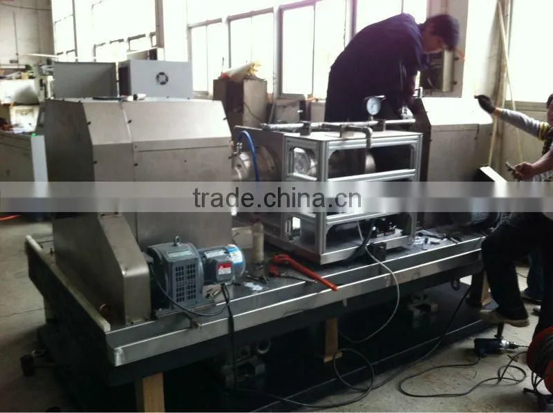 Rotary ultrasonic testing system for high speed tube testing directly in the production line