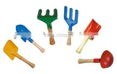 iron sapde with wooden handle garden tool wooden rake wooden shovel wooden spade