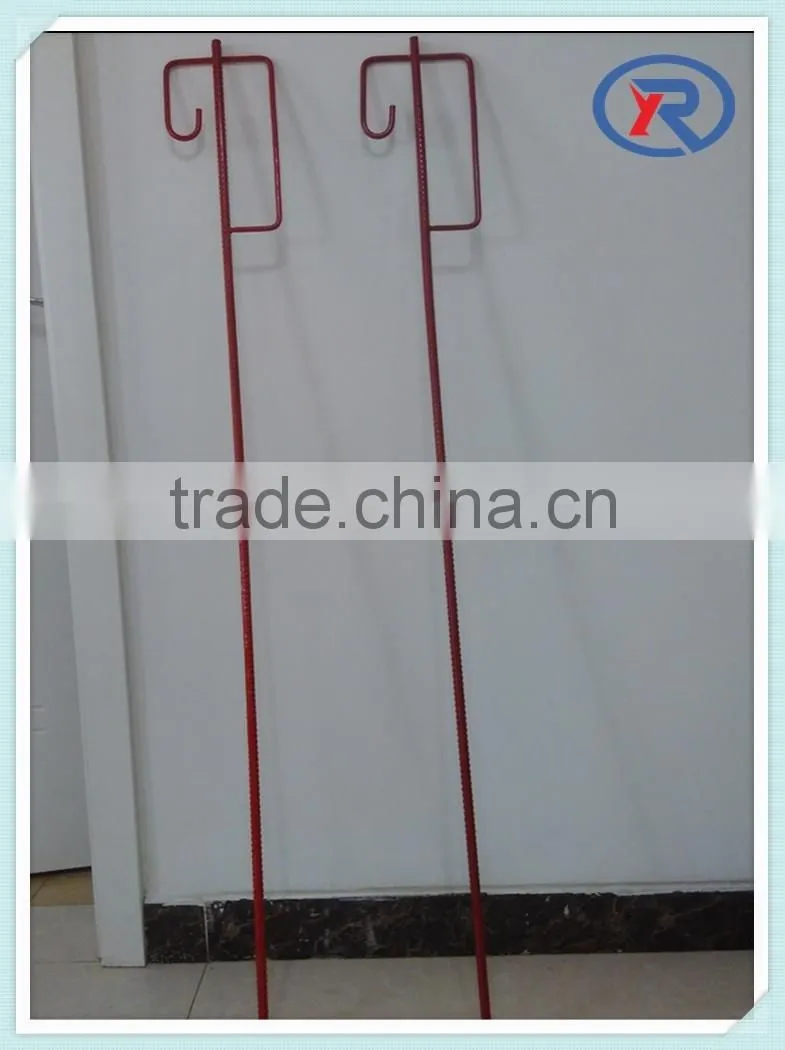 red painted steel picket fence post