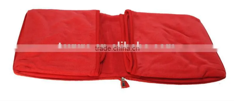 Red fleece blanket for airplane and travel zip up to a bag easy for carry
