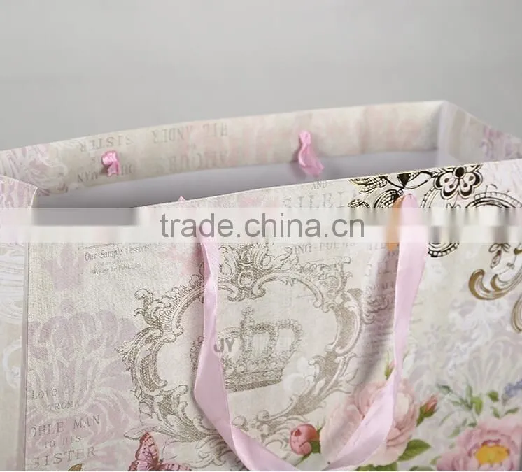 New fashion pre coating door gift luxury and fashion paper bag for printing