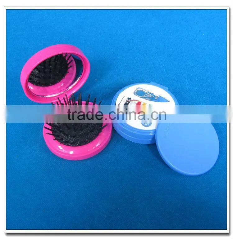Plastic hair brush with sewing kits and mirror