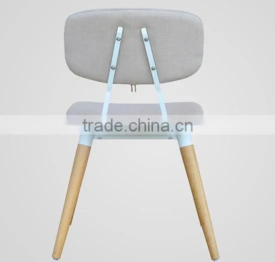 blue fabric upholstered dining room chair with leather