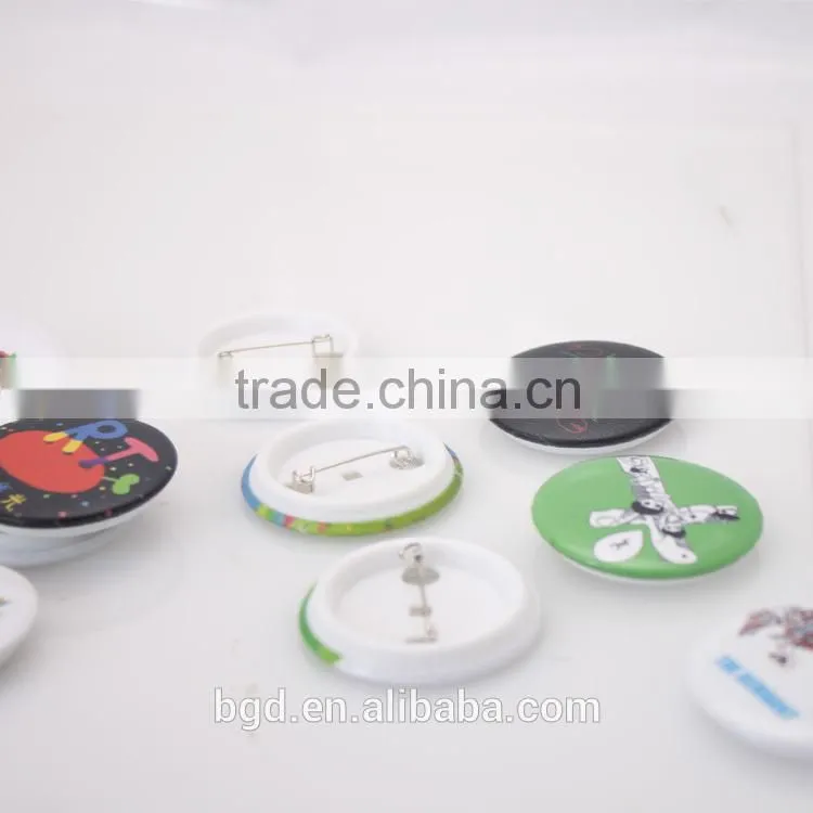 Custom made tin badge with metal button