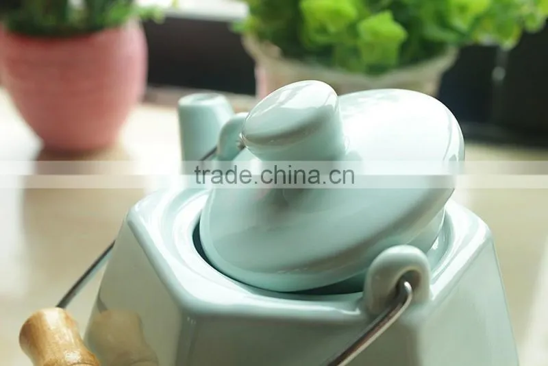 Customize logo porcelain chinese tea pot with steel handle