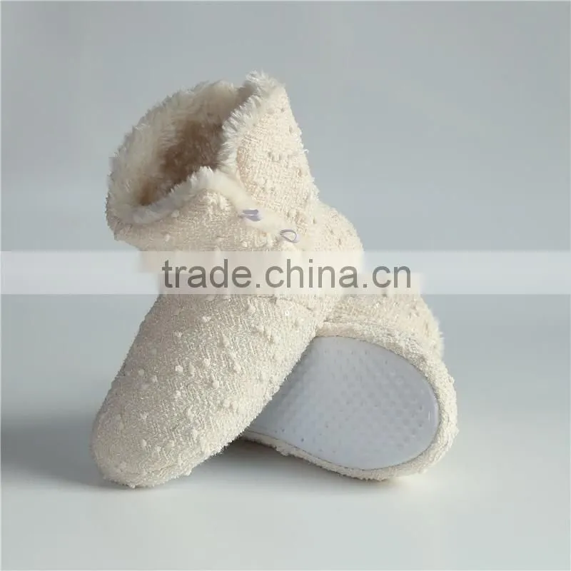 Ladies slipper boots with button