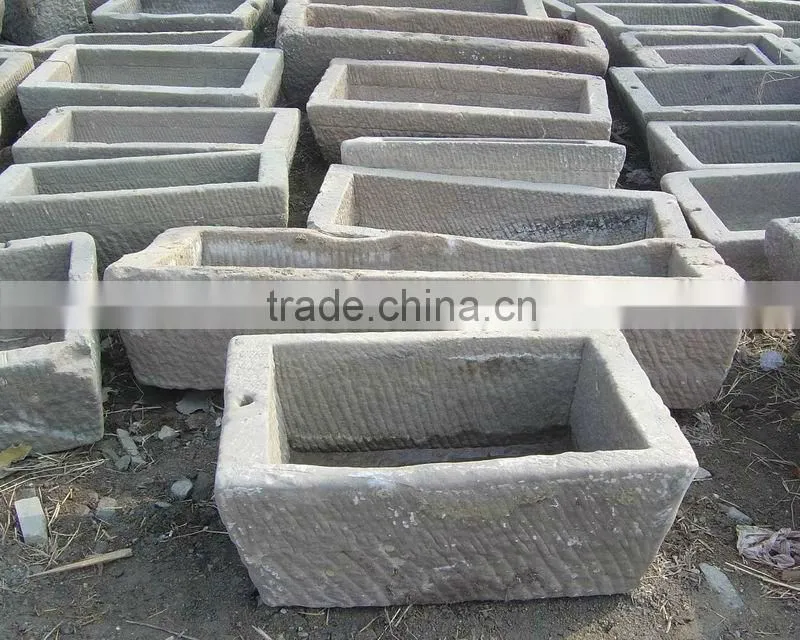 Antique stone troughs