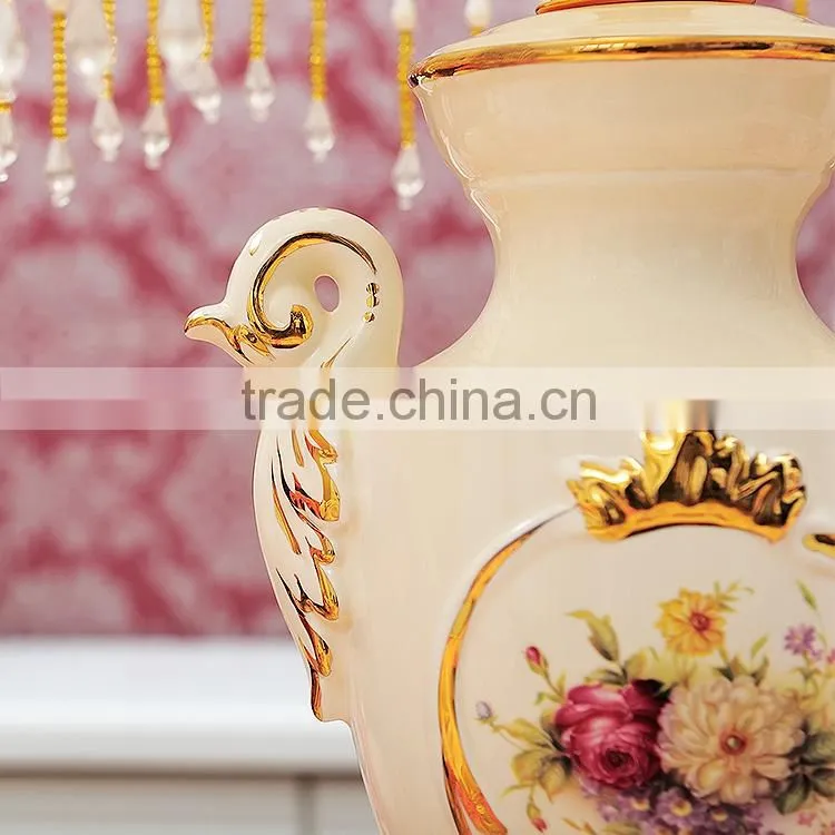 Gold outline home goods ceramic vase table lamp in bedroom