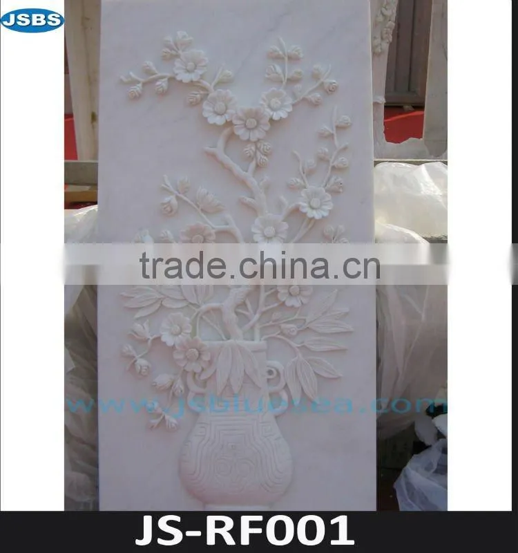 White marble flower relief