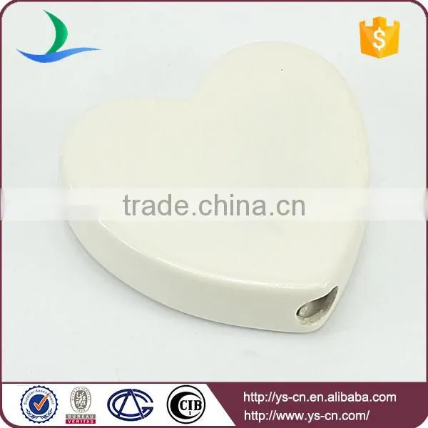 heart shape ceramic decoration with love relief