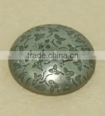 brass button with flower smile face