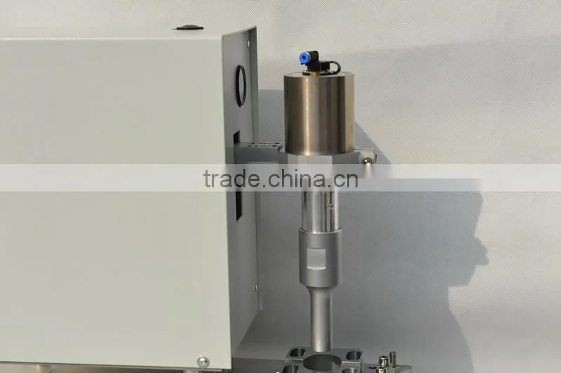 Ultrasonic stripper machine for mineral insulated cables