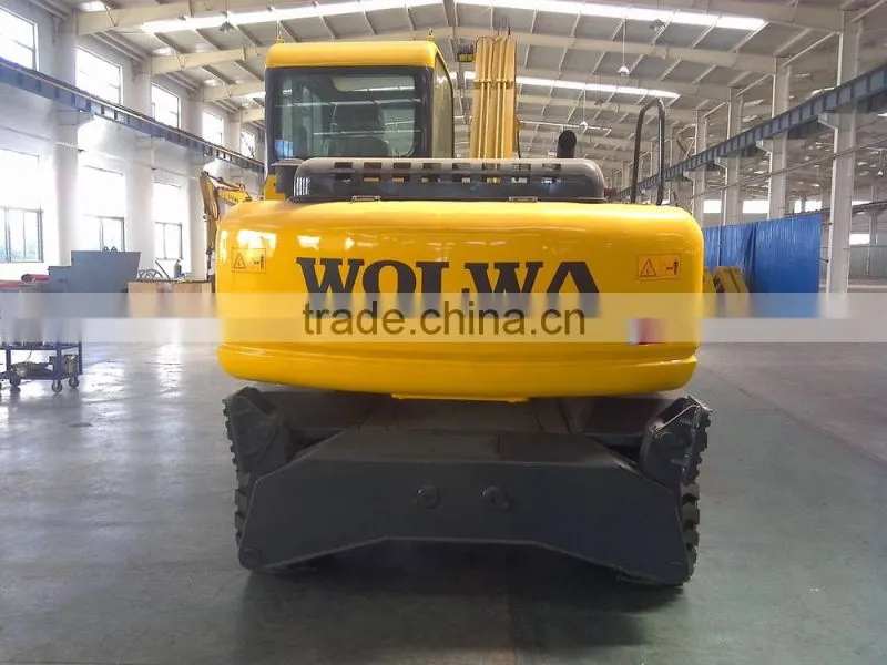 wheel excavator with front dump and back fixed leg