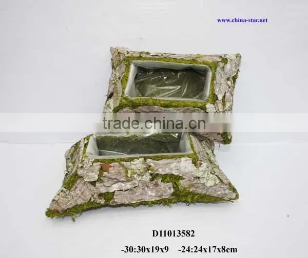 cemetary flower pot made of moss