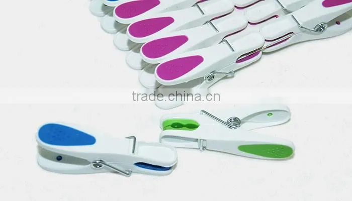 packed into plastic basket new material hanging colored peg for clothes