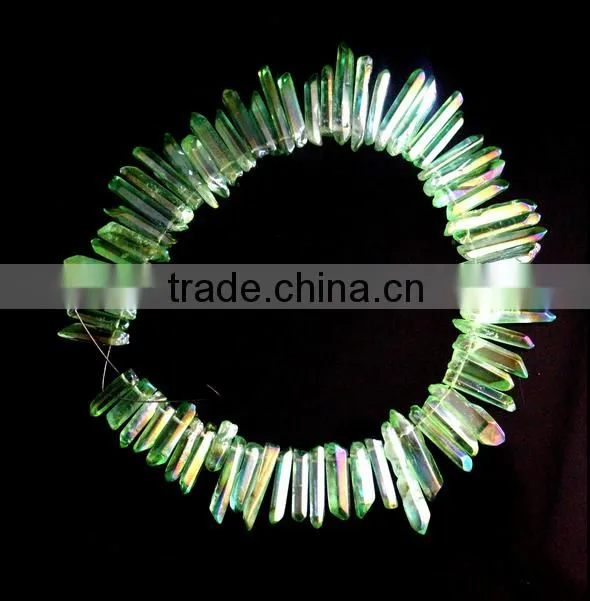 Green aura of titanium coating on quartz crystal necklace for healing