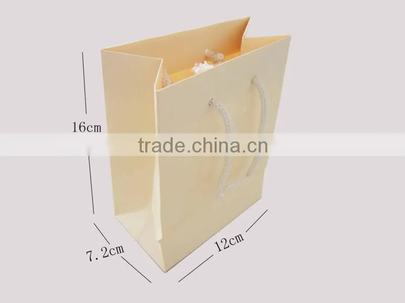 Fancy peige paper bags with cotton rope handle