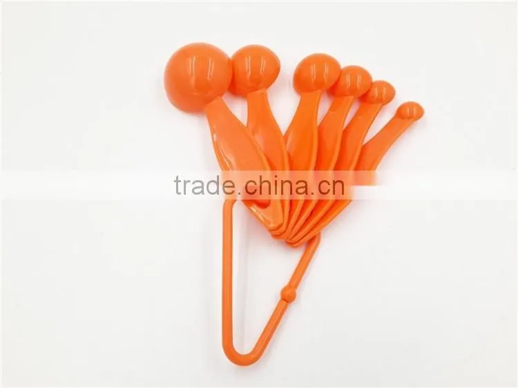 Plastic disposable measuring spoon