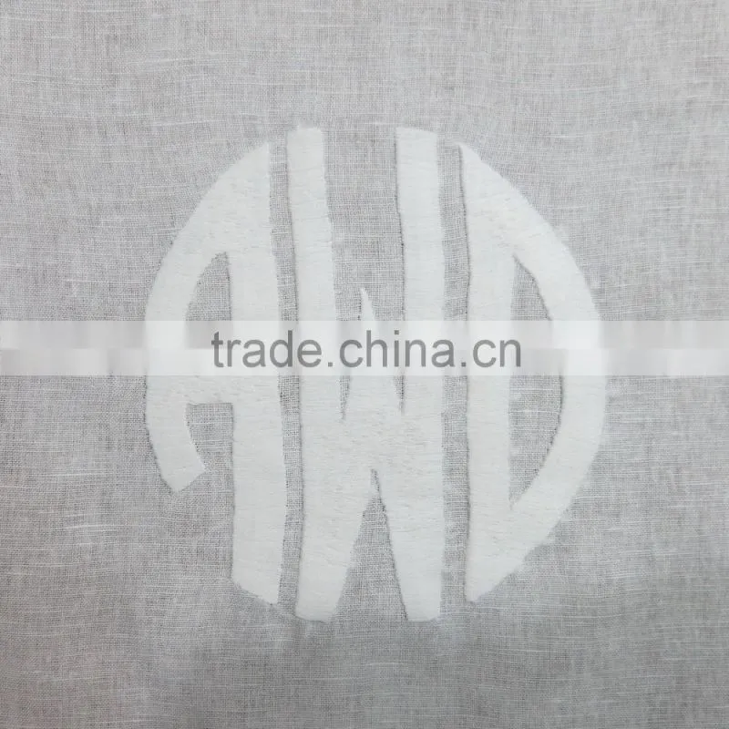 Monogram white linen table runner with natural border