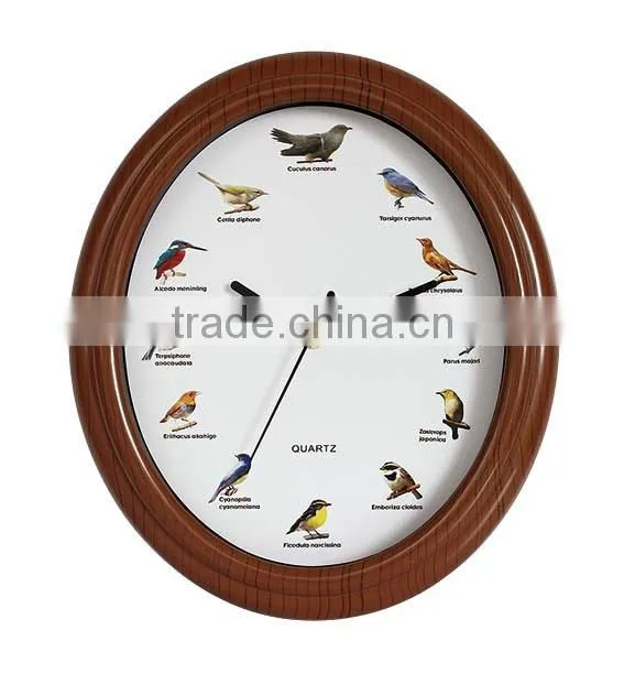 brown wall clock with bird sound