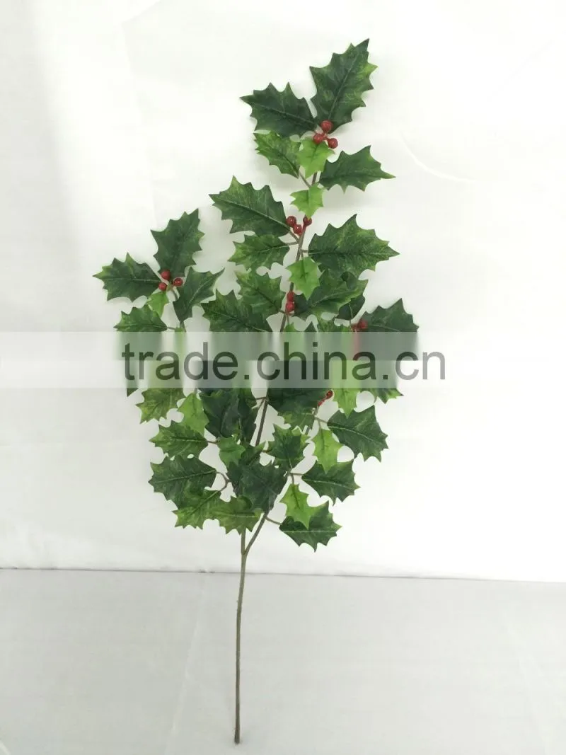 Artificial holly plant branch with red berries for xmas decoration