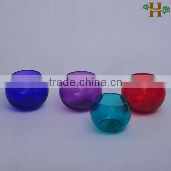 Hand blown colored glass candle holder