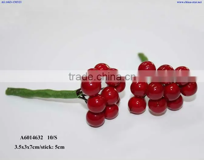 artificial red berries with pinecone