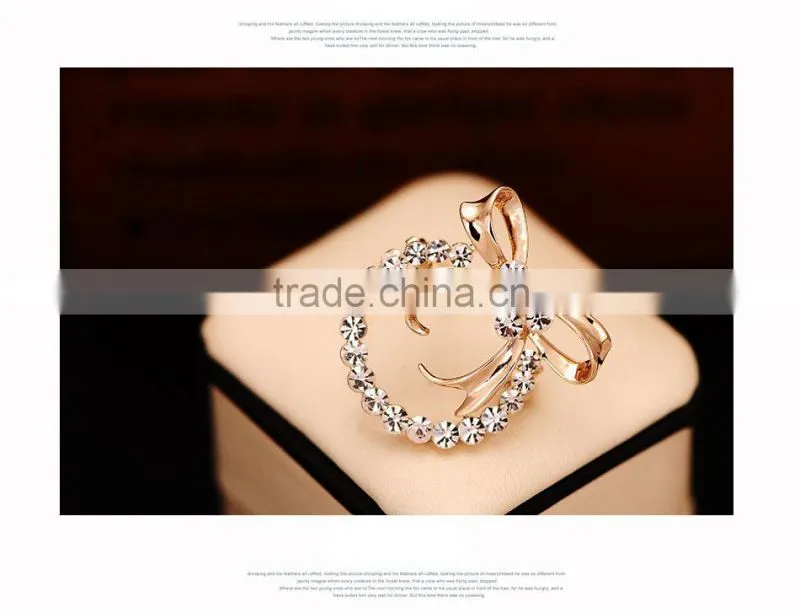 GOLDEN COLOR ZINC ALLOY BOWKNOT RHINESTONE BROOCH