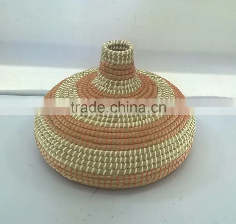 Pink and natural Seagrass handicraft basket