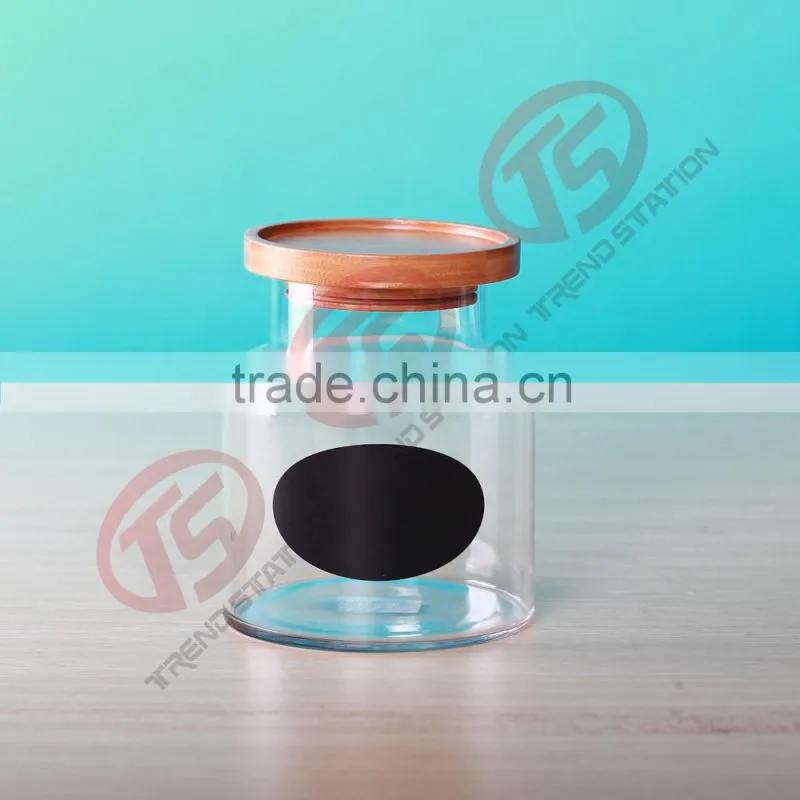 glass small jars with wood cover and black sticker