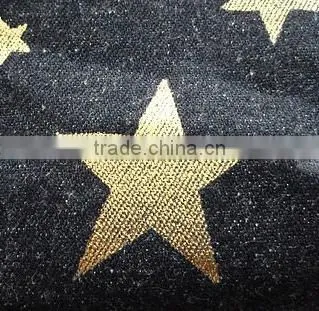 Beautiful zip cosmetic bag made from denim fabric with metallic gold star print