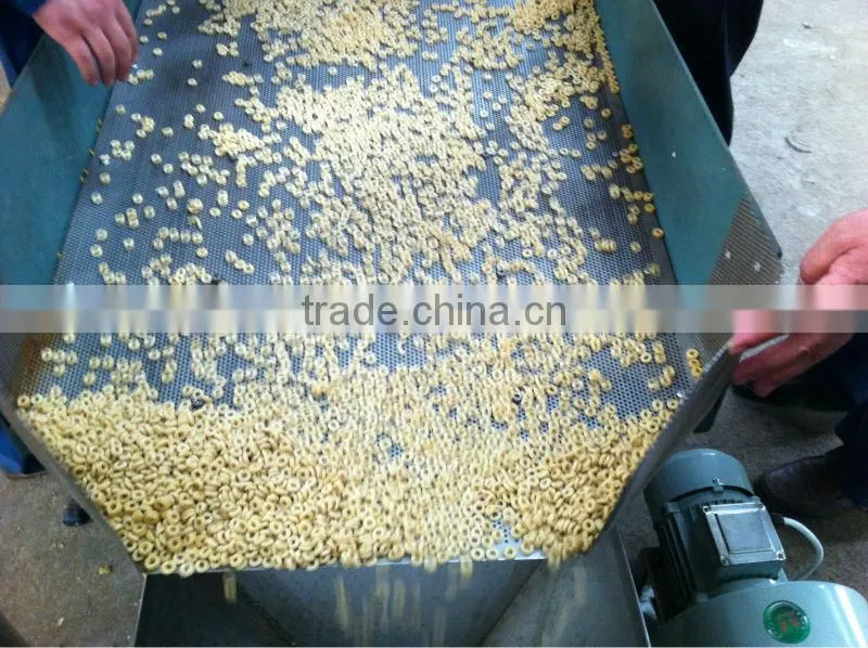 Breakfast cereal puff extruder processing line