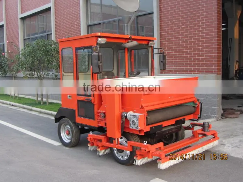 Tractor driven sand spreader