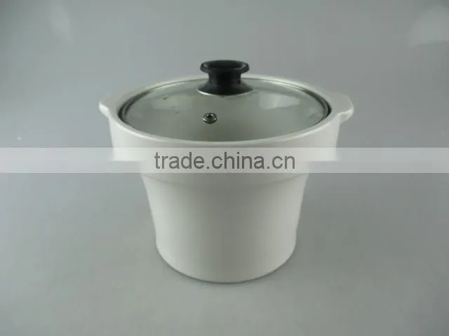 Stocked ceramic tureen with glass lid and iron stand