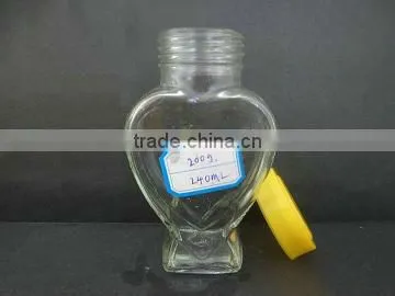 clear storage jar for honey, empty glass bottle