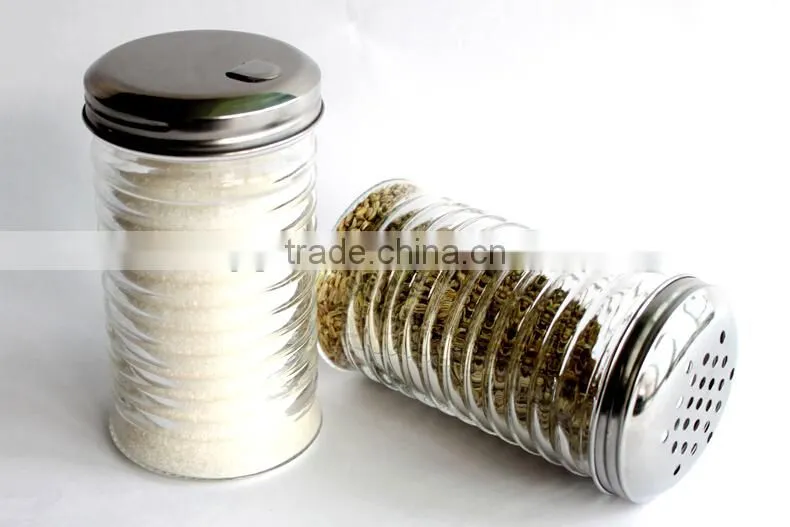 glass condiment dispenser with metal hole caps
