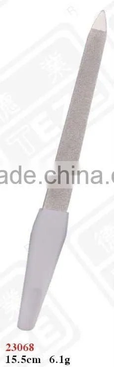 white plastic handle nail file