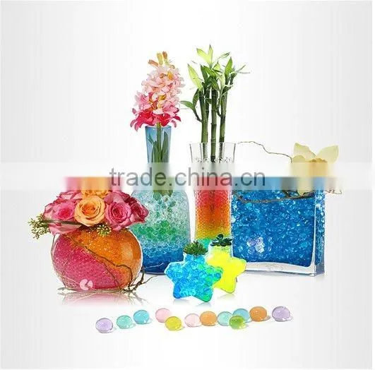 Orange water bead goes with floating candle! Romantic