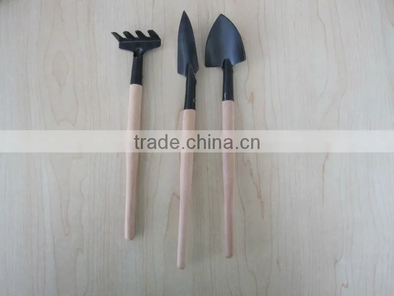 iron sapde with wooden handle garden tool wooden rake wooden shovel wooden spade