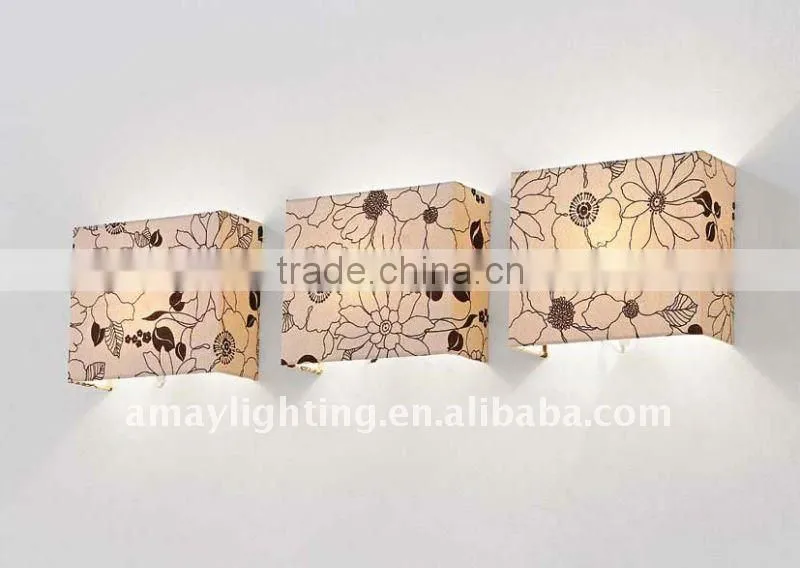 antique sconce with three shades by Amay Lighting MB912