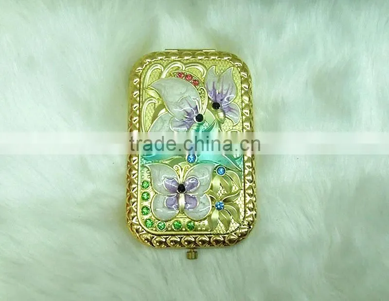 Gold butterfly pocket mirror with rhinestone