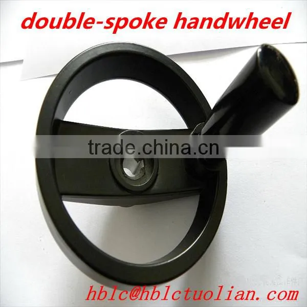 The witha folded handle with double-spoke wheel